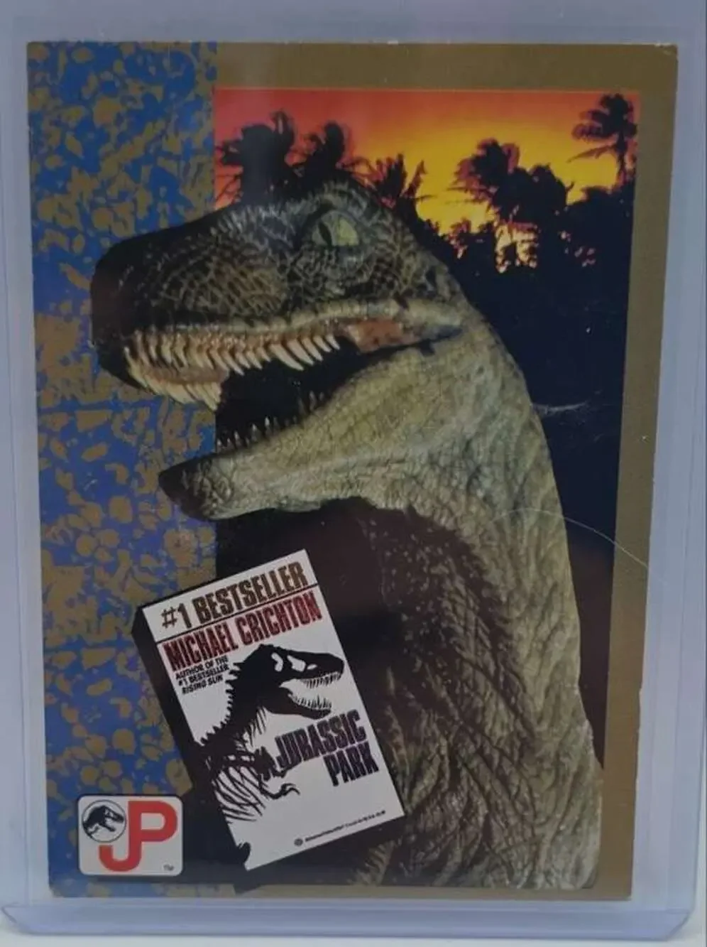 1993 Topps Jurassic Park Gold #71 The Novel By Michael Crichton Fair